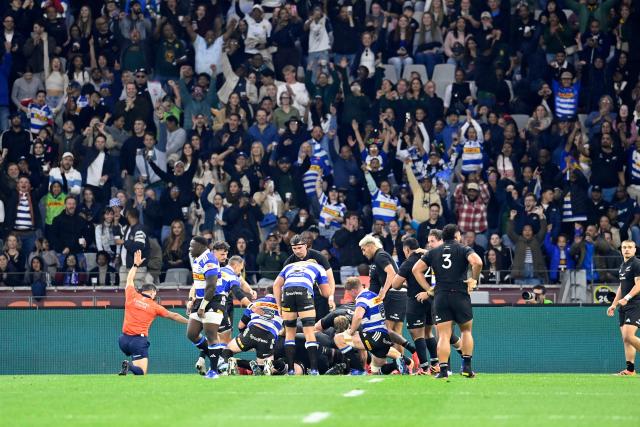 Stormers' South African hooker Andre-Hugo Venter scores a try during a rugby union tour match between the Stormers and New Zealand at the Cape Town Stadium in Cape Town on August 7, 2026. (Photo by Rodger Bosch / AFP)
