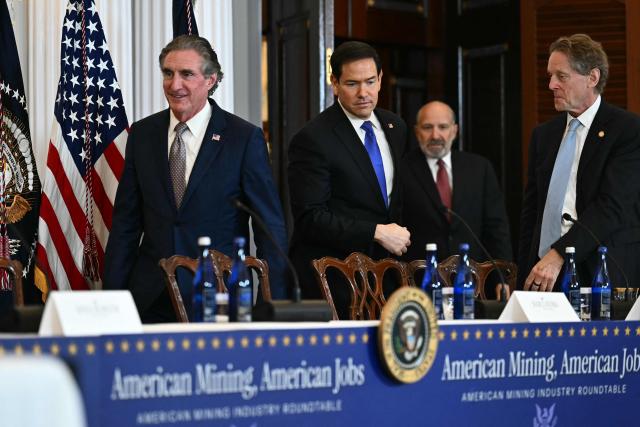 (L/R) US Secretary of the Interior Doug Burgum, US Secretary of State Marco Rubio and US Secretary of Commerce Howard Lutnick arrive to participate in a roundtable on the American mining industry at the US Department of State in Washington, DC, on August 7, 2026. (Photo by Kent NISHIMURA / AFP)