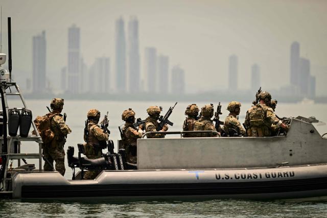 Soldiers from several countries take part in the multinational Panamax 2026 exercise at the Pacific entrance to the Panama Canal in Panama on August 7, 2026. The Panamax 2026 exercise brings together 1,700 military personnel from armed forces across the Americas, the Caribbean and Europe to strengthen regional cooperation and interoperability. (Photo by MARTIN BERNETTI / AFP)