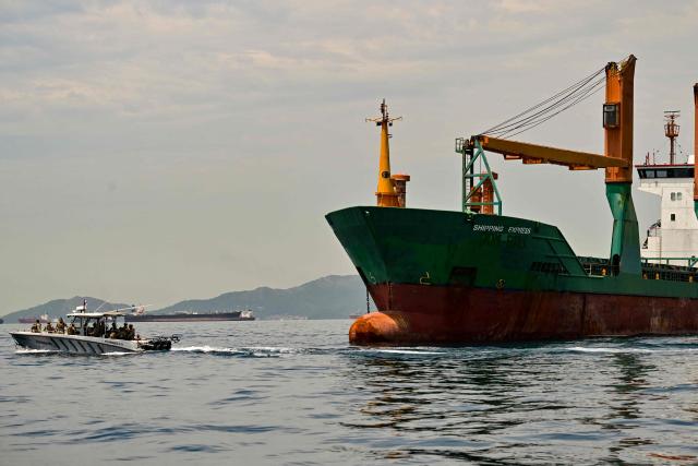 Soldiers from several countries take part in the multinational Panamax 2026 exercise at the Pacific entrance to the Panama Canal in Panama on August 7, 2026. The Panamax 2026 exercise brings together 1,700 military personnel from armed forces across the Americas, the Caribbean and Europe to strengthen regional cooperation and interoperability. (Photo by MARTIN BERNETTI / AFP)