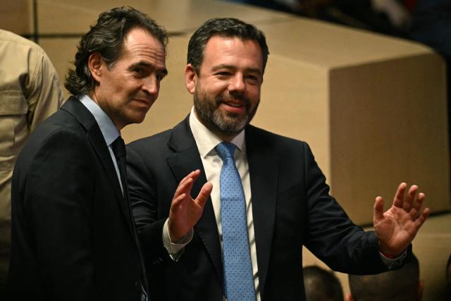 Medellin's mayor Federico Gutierrez (L) and Bogota's mayor Juan Fernando Galan wait for the start of the swearing-in ceremony of Colombia's new President Abelardo de la Espriella at the Universidad Santiago de Cali in Cali, Colombia, on August 7, 2026. (Photo by Luis ACOSTA / AFP)