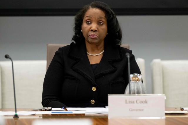 (FILES) Lisa Cook, member of the Board of Governors of the US Federal Reserve, attends a Federal Reserve Board open meeting discussing proposed revisions to the board's supplementary leverage ratio standards at the Federal Reserve Board building in Washington, DC, on June 25, 2025. US President Donald Trump is moving forward with an attempt to remove Federal Reserve Governor Lisa Cook over mortgage fraud allegations, according to a White House letter seen by AFP on August 7, 2026, after the Supreme Court batted him back in June. (Photo by SAUL LOEB / AFP)