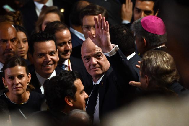 FIFA's president Gianni Infantino waves on arrival for the swearing-in ceremony of Colombia's new President Abelardo de la Espriella at Universidad Santiago de Cali in Cali, Colombia, on August 7, 2026. (Photo by Luis ACOSTA / AFP)