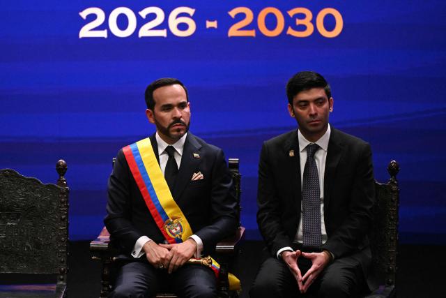 Colombia's new President Abelardo de la Espriella (L) looks on next to President of the Chamber of Representatives of Colombia Nicolas Barguil during his inauguration ceremony at the Universidad Santiago de Cali in Cali, Colombia, on August 7, 2026. (Photo by Luis ACOSTA / AFP)