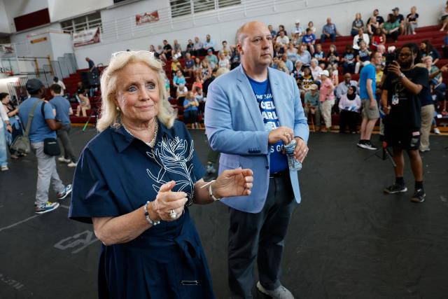 US Rep. Debbie Dingell (D-MI) and Curtis Hertel Jr., Party chair of the Michigan Democratic Party, attend a General Election Kickoff Rally at Renaissance High School in Detroit, Michigan, on August 7, 2026. (Photo by JEFF KOWALSKY / AFP)