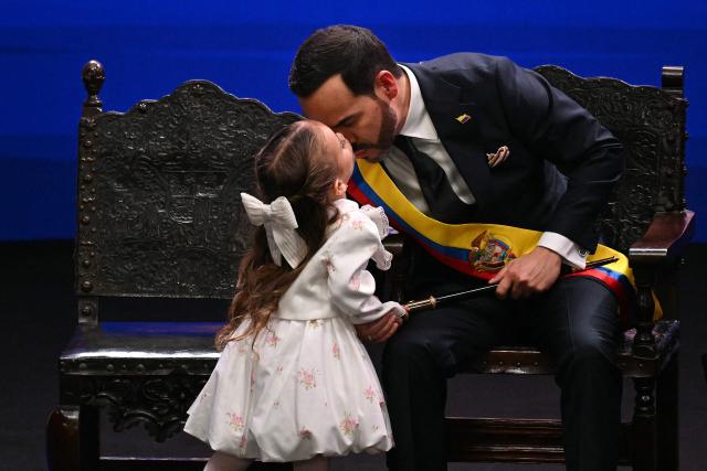Colombia's new President Abelardo de la Espriella kisses his daughter Francesca during his inauguration ceremony at the Universidad Santiago de Cali in Cali, Colombia, on August 7, 2026. (Photo by Luis ACOSTA / AFP)