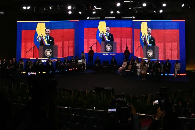 Guests at Universidad Santiago de Cali watch Colombia's new President Abelardo de la Espriella deliver a speech from the Pichincha Battalion in Cali on giant screens during his inauguration ceremony in Cali, Colombia, on August 7, 2026. (Photo by Luis ACOSTA / AFP)