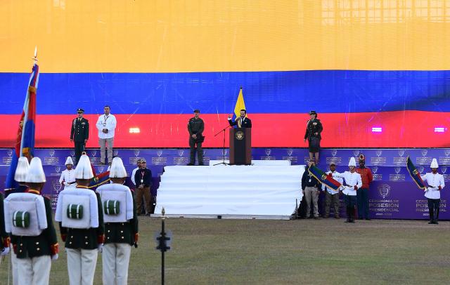 Colombia's new President Abelardo de la Espriella (C) delivers a speech at the Pichincha Battalion after swearing in, in Cali, Colombia, on August 7, 2026. (Photo by Jaime SALDARRIAGA / AFP)
