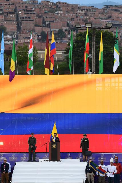Colombia's new President Abelardo de la Espriella (C) delivers a speech at the Pichincha Battalion after swearing in, in Cali, Colombia, on August 7, 2026. (Photo by Jaime SALDARRIAGA / AFP)