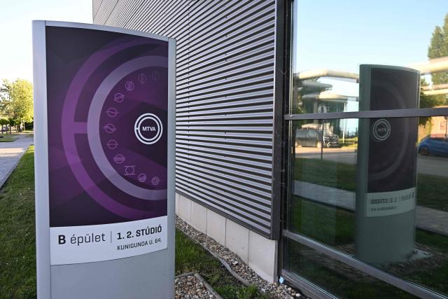 (FILES) Photo taken on May 28, 2026 shows a sign indicating tv studios of Hungarian MTVA state television situated at the company's headquarters in the 3rd district of Budapest, Hungary. A month after Hungary's state broadcaster has halted transmissions of news programmes, many employees spend days at home, waiting to learn when -- or if -- they can return to work.
The reorganisation of public media was a key campaign pledge for pro-EU Prime Minister Peter Magyar, who ousted nationalist Viktor Orban at the April elections, promising a "system change". (Photo by Attila KISBENEDEK / AFP)