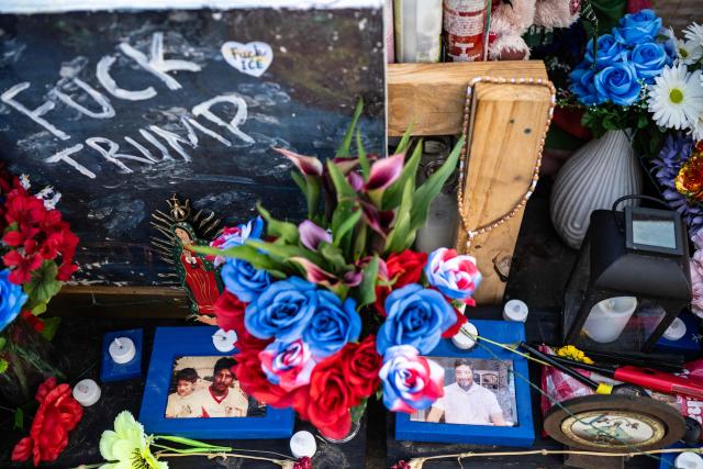 Photos of Lorenzo Salgado Araujo, a 52-year-old Mexican construction worker who was fatally shot during a US Immigration and Customs Enforcement (ICE) operation, are placed at a makeshift memorial during a vigil and celebration of his life in Houston, Texas, on August 7, 2026. The son of a Mexican man fatally shot by US immigration officials in Texas demanded an investigation, with a leading civil rights group calling it a "possible murder." Lorenzo Salgado was killed by an ICE officer in Houston, Texas, early on July 7, marking the first fatal shooting involving US immigration officers since two January killings in the northern city of Minneapolis that drew national headlines. (Photo by RONALDO SCHEMIDT / AFP)