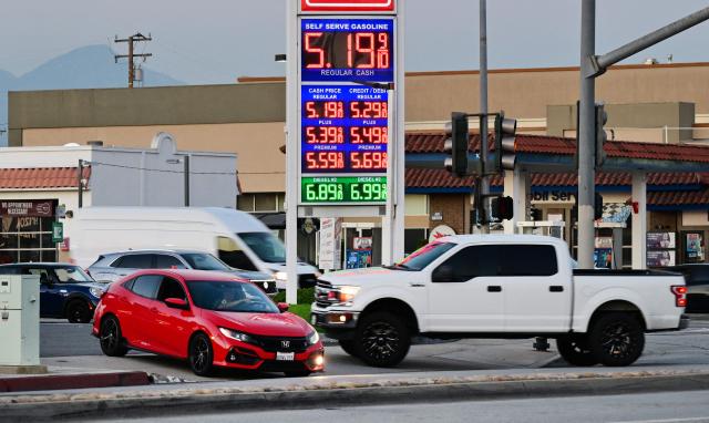 Drivers pull their vehicles in and out of a gas station in La Puente, California, on August 7, 2026. The US unexpectedly lost thousands of jobs in July, government data showed on August 7, a blow to President Donald Trump's claims of leading an economic revival as his Republican Party gears up for crucial midterm elections. The unemployment rate ticked down to 4.1 percent, likely a result of falling labor supply as the US economy grapples with an aging population and lower net migration. Since taking office for his second term, Trump has unleashed a spate of policies aimed at reviving domestic manufacturing and curbing surging inflation. (Photo by Frederic J. BROWN / AFP)