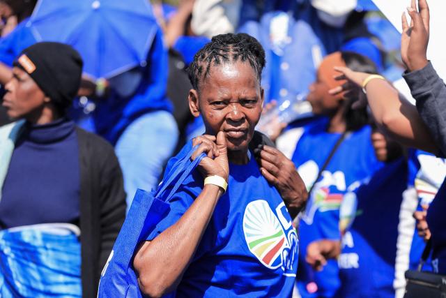 Democratic Alliance (DA) supporters gather in Johannesburg on August 8, 2026 during the party Manifesto launch ahead of November 2026 South Africa local elections. (Photo by MZINGENKOSI SIBANDA / AFP)