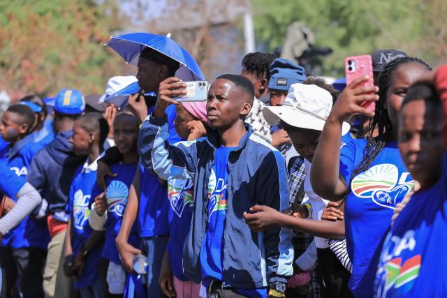 Democratic Alliance (DA) supporters gather in Johannesburg on August 8, 2026 during the party Manifesto launch ahead of November 2026 South Africa local elections. (Photo by MZINGENKOSI SIBANDA / AFP)