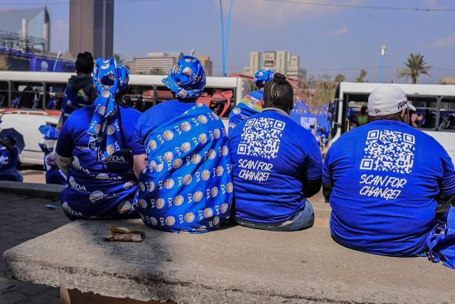 Democratic Alliance (DA) supporters gather in Johannesburg on August 8, 2026 during the party Manifesto launch ahead of November 2026 South Africa local elections. (Photo by MZINGENKOSI SIBANDA / AFP)