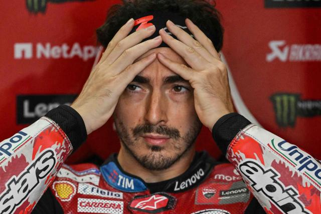 Ducati Lenovo Team's Italian rider Francesco Bagnaia is pictured in the garage on the second day of the MotoGP British Grand Prix weekend at Silverstone circuit, central England on August 8, 2026. (Photo by Glyn KIRK / AFP)