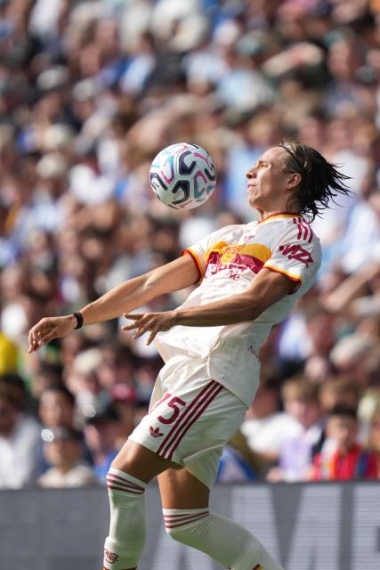 Roma's Italian defender #75 Filippo Reale controls the ball during the friendly pre-season football match between between Brighton and Hove Albion and Roma at the American Express Community Stadium in Brighton, southern England on August 8, 2026. (Photo by CARLOS JASSO / AFP)