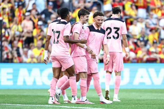 Sunderland's Northern Irish defender #32 Trai Hume (2ndL) celebrates with his teammates after scoring his team's first goal during the friendly football match between RC Lens and AFC Sunderland at the Bollaert-Delelis Stadium in Lens, northern France, on August 8, 2026. (Photo by Sameer Al-DOUMY / AFP)