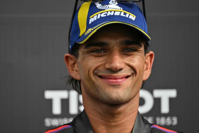 Winner Aprilia Racing's Spanish rider Jorge Martin smiles on the podium after the MotoGP Sprint Race on the second day of the MotoGP British Grand Prix weekend at Silverstone circuit, central England on August 8, 2026. (Photo by Glyn KIRK / AFP)