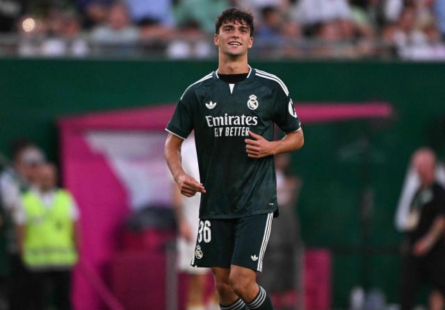 Real Madrid's Spanish defender #36 Mario Rivas celebrates scoring during the pre-season football match between Ferencvaros and Real Madrid in Budapest, Hungary on August 8, 2026. Real Madrid on August 6, 2026 announced a new six-year deal for star forward Vinicius Junior and the signing of teenage sensation Yan Diomande in a major boost to their quest to end a two-year trophy drought. (Photo by Attila KISBENEDEK / AFP)