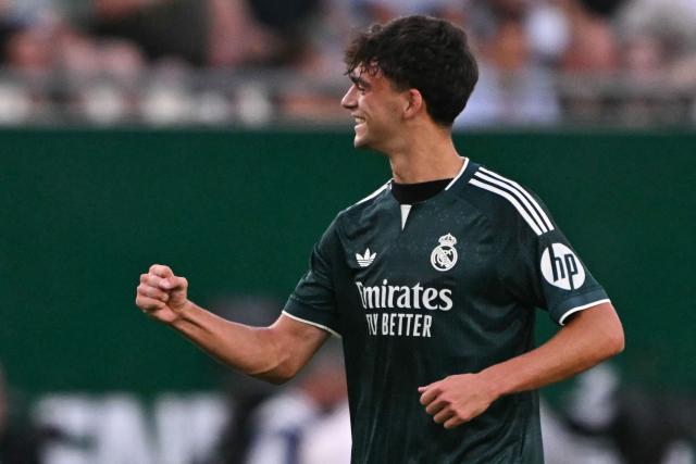 Real Madrid's Spanish defender #36 Mario Rivas celebrates scoring during the pre-season football match between Ferencvaros and Real Madrid in Budapest, Hungary on August 8, 2026. Real Madrid on August 6, 2026 announced a new six-year deal for star forward Vinicius Junior and the signing of teenage sensation Yan Diomande in a major boost to their quest to end a two-year trophy drought. (Photo by Attila KISBENEDEK / AFP)