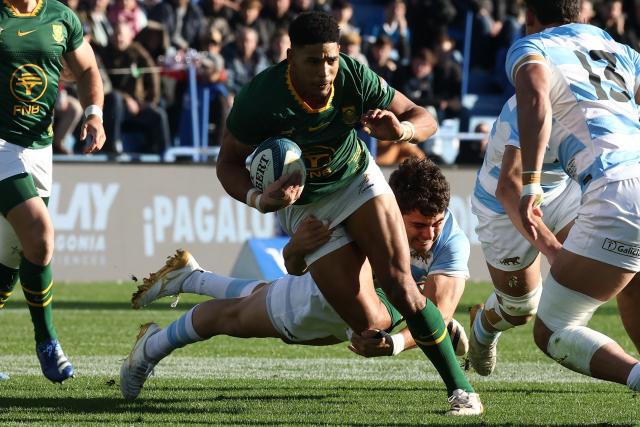 South Africa's fly half Sacha Feinberg-Mngomezulu is tackled by Argentina's centre Faustino Sanchez Valarolo during a Rugby Union one-off test match between Argentina and South Africa at the Jose Amalfitani stadium in Buenos Aires on August 8, 2026. (Photo by Alejandro PAGNI / AFP)