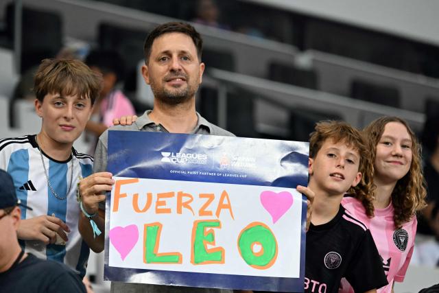 Inter Miami fans hold a sign with a message to Argentine forward Lionel Messi ahead of the Leagues Cup 2026 group-stage football match between Inter Miami CF and Monterrey at Nu Stadium in Miami, Florida, on August 8, 2026. Jorge Messi, the father and agent of Lionel Messi, has died aged 68 in Rosario, Argentina, the eight-time Ballon d'Or winner's childhood club Newell's Old Boys announced on August 8. (Photo by CHANDAN KHANNA / AFP)