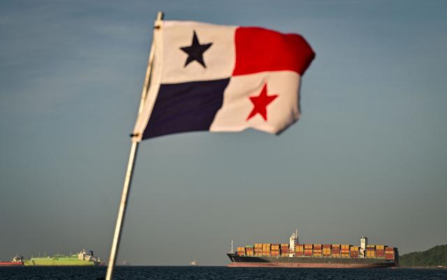 A cargo ship waits before entering the Panama Canal in Panama City on August 8,2026. (Photo by MARTIN BERNETTI / AFP)