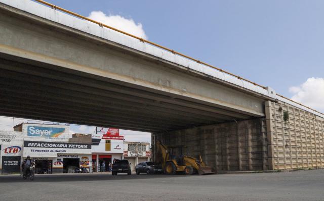 View of the vehicular bridge in the community of Pozo de Gamboa, in the municipality of Panuco, Zacatecas state, Mexico, on August 7, 2026, where five men were found dead. A community in Mexico woke up one day in July to find five bodies hanging from a bridge. It was a reminder that the violence had never gone away. The bodies were found in Pozo de Gamboa, a community of just 5,000 residents in the state of Zacatecas, which connects the central part of the country with the north and west and is home to key drug trafficking routes. (Photo by Jesse Mirales / AFP)