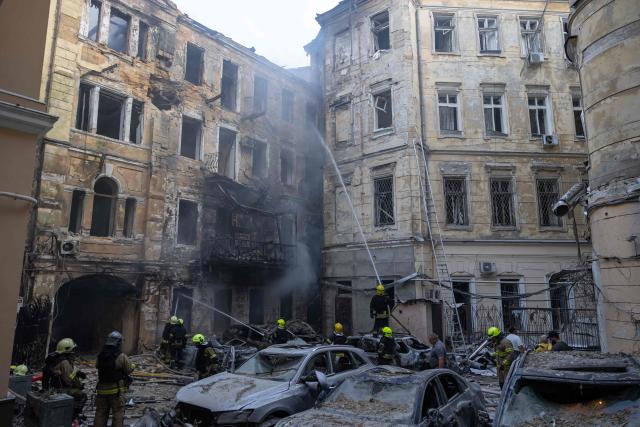 Ukrainian rescuers work in the courtyard of a damaged building at the site of a Russian air attack in Odesa on August 9, 2026, amid the Russian invasion in Ukraine. (Photo by Oleksandr GIMANOV / AFP)