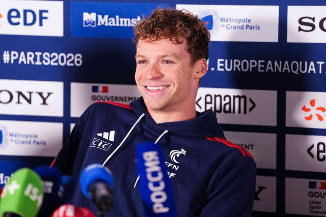 French swimmer Leon Marchand speaks during a press conference as part of the LEN European Aquatics Championships at the Olympic Aquatics Centre in Saint-Denis, northeastern suburbs of Paris on August 9, 2026. (Photo by Dimitar DILKOFF / AFP)