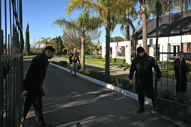 View of security personnel at the entrance of El Prado cemetery on the outskirts of Rosario, Santa Fe province, Argentina, on August 9, 2026, where the funeral of Argentina's football star Lionel Messi's father will take place. Jorge Messi, the father and agent of Lionel Messi, has died aged 68, the eight-time Ballon d'Or winner's childhood club Newell's Old Boys announced on August 8, 2026. (Photo by Luis ROBAYO / AFP)