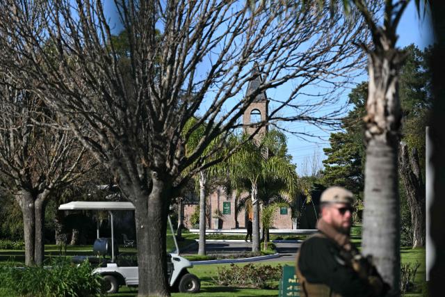 View of security personnel near the chapel at El Prado cemetery on the outskirts of Rosario, Santa Fe province, Argentina, on August 9, 2026, where the funeral of Argentina's football star Lionel Messi's father will take place. Jorge Messi, the father and agent of Lionel Messi, has died aged 68, the eight-time Ballon d'Or winner's childhood club Newell's Old Boys announced on August 8, 2026. (Photo by Luis ROBAYO / AFP)
