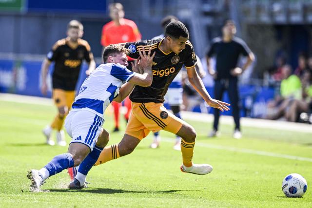 PEC Zwolle's Dutch defender #03 Olivier Aertssen (L) fights for the ball with Ajax's Moroccan midfielder #10 Abdellah Ouazane during the Dutch Eredivisie football match between PEC Zwolle and Ajax Amsterdam at MAC3Park stadium in Zwolle on August 9, 2026. (Photo by Olaf Kraak / ANP / AFP) / Netherlands OUT