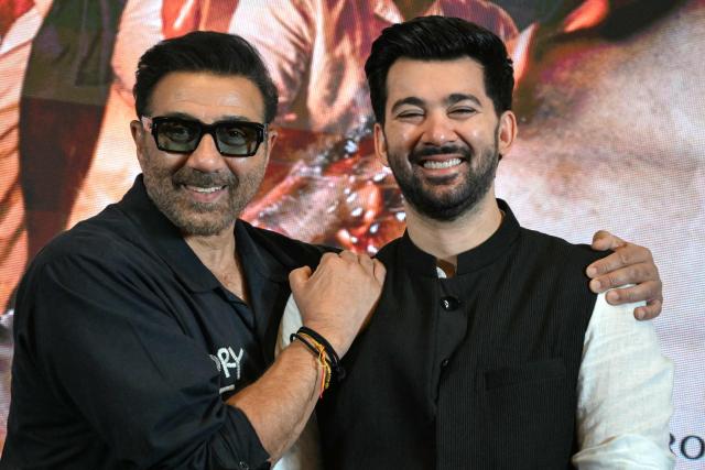 Bollywood actor Sunny Deol and his son Karan Deol pose for photographs during the promotion of their upcoming film 'Batwara 1947' in Amritsar on August 9, 2026. (Photo by Narinder NANU / AFP)