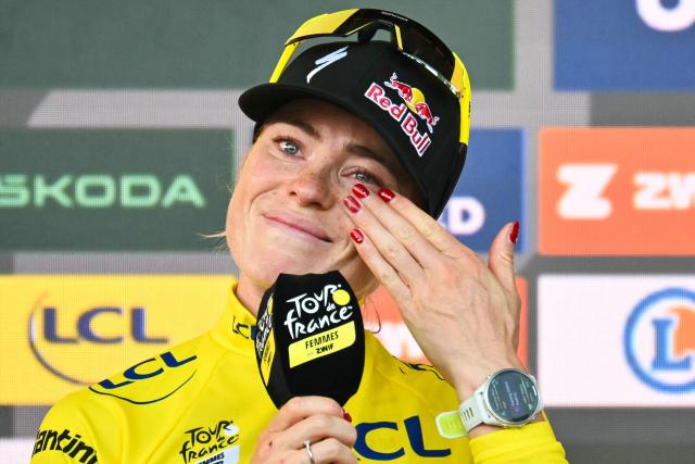 FDJ-SUEZ's Dutch rider Demi Vollering reacts on the podium after winning the 9th and final stage of the fifth edition of the Women's Tour de France cycling race, 99.2 km from Nice to Nice, southeastern France on August 9, 2026. (Photo by NICOLAS TUCAT / AFP)