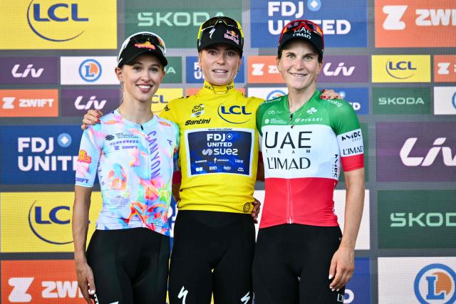 (FROM L) Second place Canyon//SRAM zondacrypto's Polish rider Katarzyna Niewiadoma, winner FDJ-SUEZ's Dutch rider Demi Vollering and third place UAE Team ADQ's Italian rider Elisa Longo Borghini celebrate on the podium at the end of the 9th and final stage of the fifth edition of the Women's Tour de France cycling race, 99.2 km from Nice to Nice, southeastern France on August 9, 2026. (Photo by NICOLAS TUCAT / AFP)