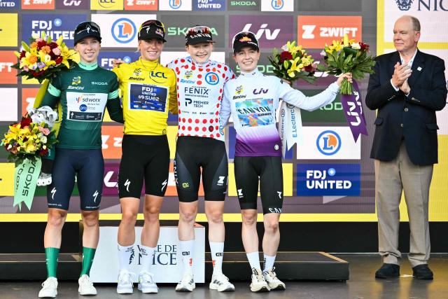 (FROM L) Team SD Worx-Protime's Dutch rider Lorena Wiebes - wearing the best sprinter's green jersey, FDJ-SUEZ's Dutch rider Demi Vollering - wearing the overall leader's yellow jersey, Fenix-Deceuninck's Dutch rider Puck Pieterse - wearing the best climber's polka dot (dotted) jersey  and Canyon//SRAM zondacrypto's German rider Antonia Niedermaier - wearing the best young rider's white jersey celebrate on the podium with Prince Albert II of Monaco at the end of the 9th and final stage of the fifth edition of the Women's Tour de France cycling race, 99.2 km from Nice to Nice, southeastern France on August 9, 2026. (Photo by NICOLAS TUCAT / AFP)
