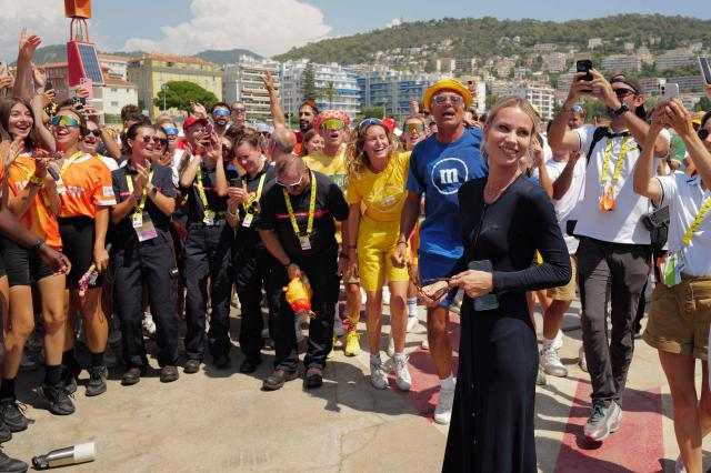 Director of the race Marion Rousse arrives to welcome caravanners during the 9th and final stage of the fifth edition of the Women's Tour de France cycling race, 99.2 km from Nice to Nice, southeastern France on August 9, 2026. (Photo by Valery HACHE / AFP)