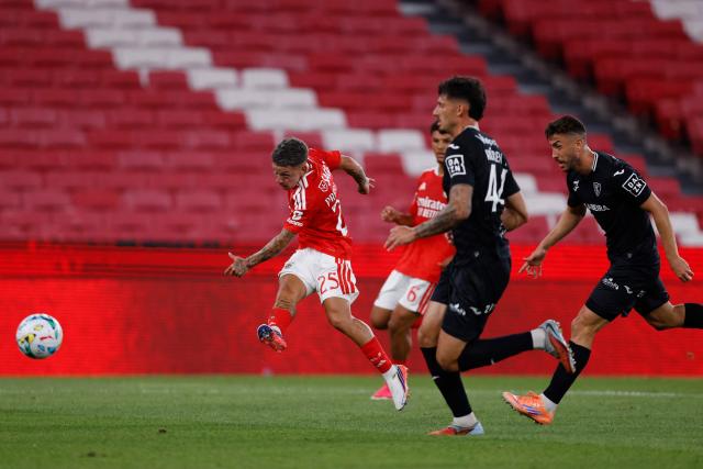 Benfica's Argentine forward #25 Gianluca Prestianni shoots during the Portuguese League football match between SL Benfica and Academico de Viseu FC at Estadio da Luz in Lisbon on August 9, 2026. (Photo by FILIPE AMORIM / AFP)