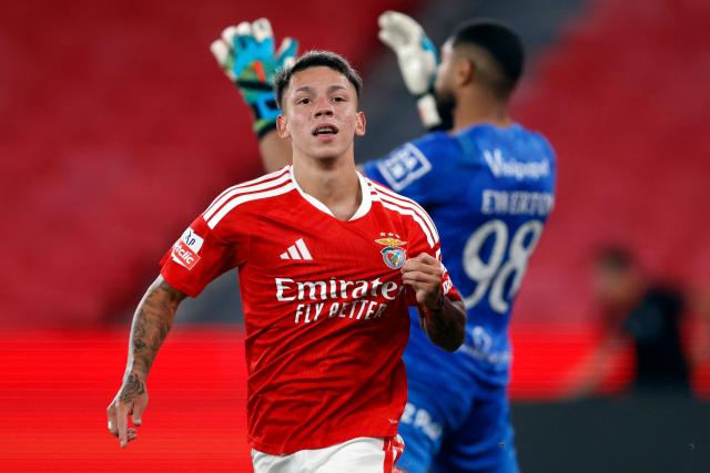 Benfica's Argentine forward #25 Gianluca Prestianni celebrates scoring his team's second goal during the Portuguese League football match between SL Benfica and Academico de Viseu FC at Estadio da Luz in Lisbon on August 9, 2026. (Photo by FILIPE AMORIM / AFP)