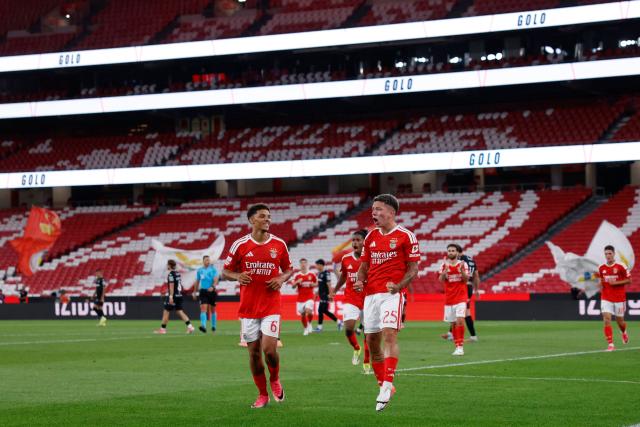 Benfica's Argentine forward #25 Gianluca Prestianni celebrates scoring his team's second goal during the Portuguese League football match between SL Benfica and Academico de Viseu FC at Estadio da Luz in Lisbon on August 9, 2026. (Photo by FILIPE AMORIM / AFP)