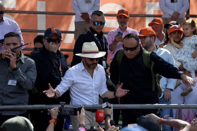 Colombia'S President Abelardo de la Espriella speaks to reporters during the traditional Silleteros parade held as part of the Flower Festival in Medellin, Antioquia department, Colombia on August 9, 2026. (Photo by Jaime SALDARRIAGA / AFP)
