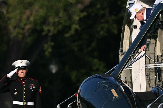 US President Donald Trump steps off Marine One after landing on the Ellipse near the White House in Washington, DC, on August 9, 2026. President Trump is returning to the White House after spending the weekend at his National Golf Club in Bedminster, New Jersey. (Photo by Brendan SMIALOWSKI / AFP)