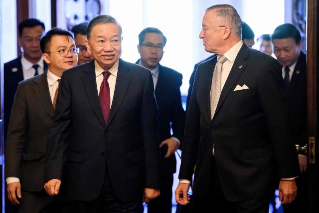 Vietnam's President To Lam (L) arrives at Government House to meet New South Wales Governor Margaret Beazley in Sydney on August 10, 2026. (Photo by BIANCA DE MARCHI / POOL / AFP)