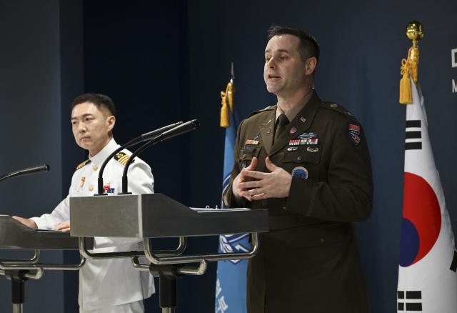 Public Affairs Director of South Korea's Joint Chiefs of Staff Col. Jang Do-young (L) and Public Affairs Director of the United Nations Command, Combined Forces Command, and United States Forces Korea (USFK) Col. Ryan Donaldn (R) attend a press briefing for the Ulchi Freedom Shield 2026 exercise at the Defence Ministry in Seoul on August 10, 2026. (Photo by SONG Kyung-Seok / POOL / AFP)