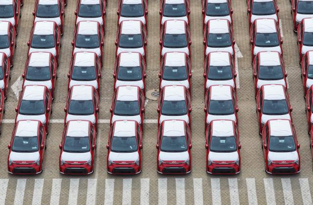 South Korean-made Kia Picanto cars are seen awaiting shipment at a vehicle storage yard in Yantai, in eastern China's Shandong province, on August 10, 2026. (Photo by CN-STR / AFP) / China OUT