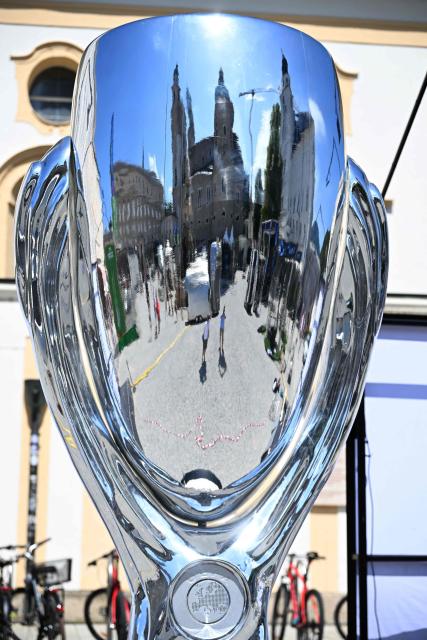 A giant replica of the trophy is pictured on August 10, 2026 at a fan area in the city centre of Salzburg, Austria, as preparations are under way for the Football Supercup football match Paris Saint Germain (PSG) vs Aston Villa to be played on August 12. (Photo by BARBARA GINDL / APA / AFP) / Austria OUT