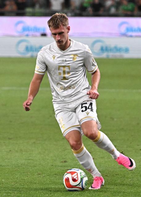 Ferencvaros' midfielder #54 Oliver Nagy plays the ball during the pre-season football match between Ferencvaros and Real Madrid in Budapest, Hungary on August 8, 2026. (Photo by Attila KISBENEDEK / AFP)