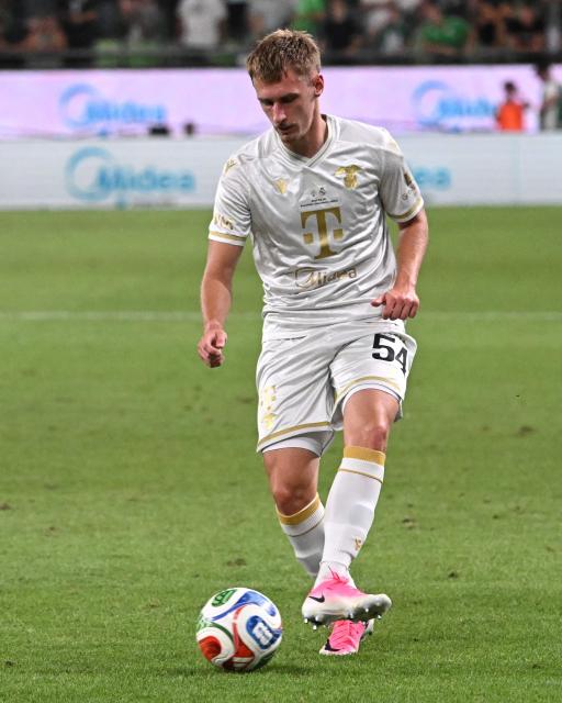 Ferencvaros' midfielder #54 Oliver Nagy plays the ball during the pre-season football match between Ferencvaros and Real Madrid in Budapest, Hungary on August 8, 2026. (Photo by Attila KISBENEDEK / AFP)